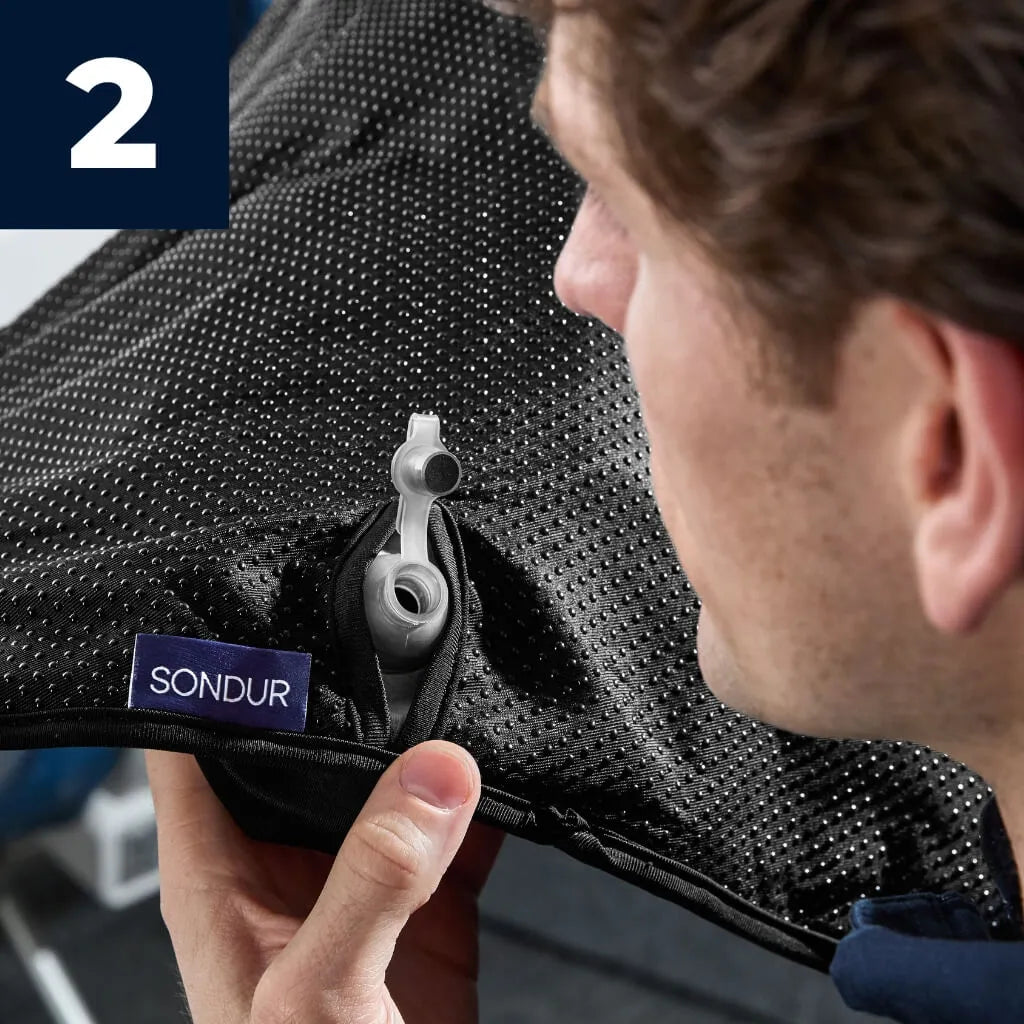 Blow into the air valve to inflate the travel cushion (Takes just 2-4 breaths).