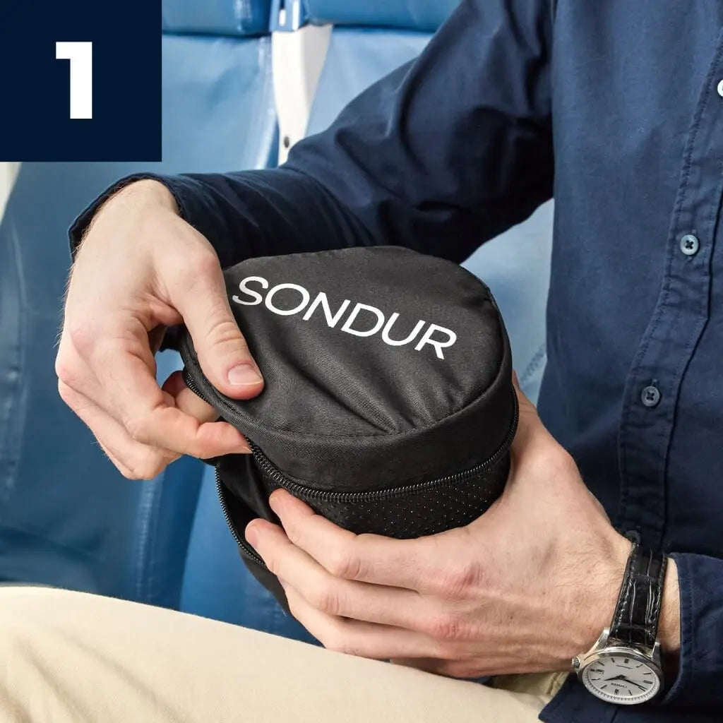 Take out the travel cushion from the carry bag.